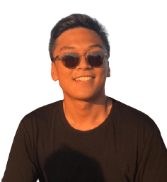 Carlo Aguinaldo SEO Marketing specialist, smiling with glasses on