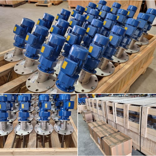 Multiple shipments of agitators or mixers, with a blue motor in a warehouse, being prepared to be sent